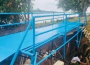 Polres Muba dan PTPN Bersama Masyarakat Bangun Jembatan Penghubung Desa